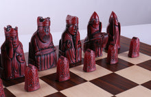 Load image into Gallery viewer, Cardinal Red Isle of Lewis Pieces on Palisander Board
