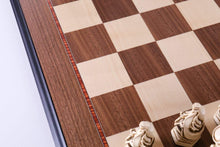 Load image into Gallery viewer, Marble and Resin Christopher Columbus Pieces on Walnut and Maple Board
