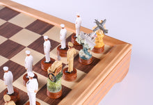 Load image into Gallery viewer, Pearl Harbor Chess Pieces on Beech Chest
